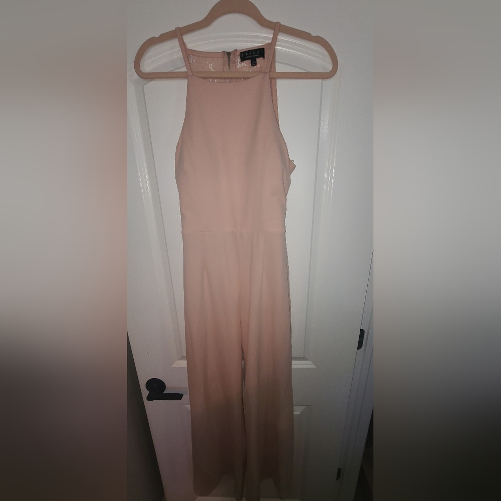 Woman's jumpsuit. Worn twice. Please look at all pics. Some dirt in places.
